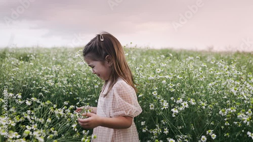 Little girl crying in a field