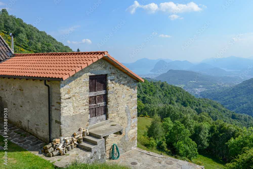 Landscape with rural house at Capriasca valley over Lugano on Switzerland