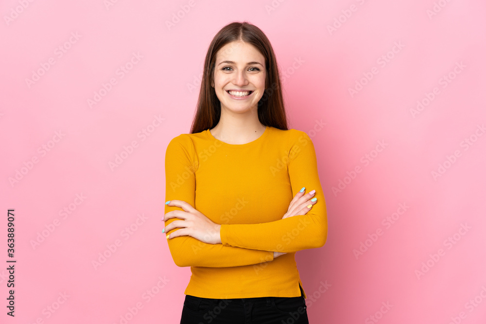Young caucasian woman isolated on pink background keeping the arms crossed in frontal position Young caucasian woman isolated on pink background keeping the arms crossed in frontal position