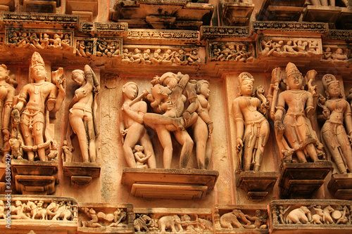 Photography Close up of artful carved walls, Ancient reliefs at famous erotic temple in Khajuraho, Madhya Pradesh, India
