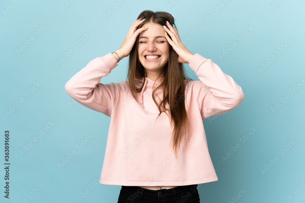 Young caucasian woman isolated on blue background laughing Young caucasian woman isolated on blue background laughing