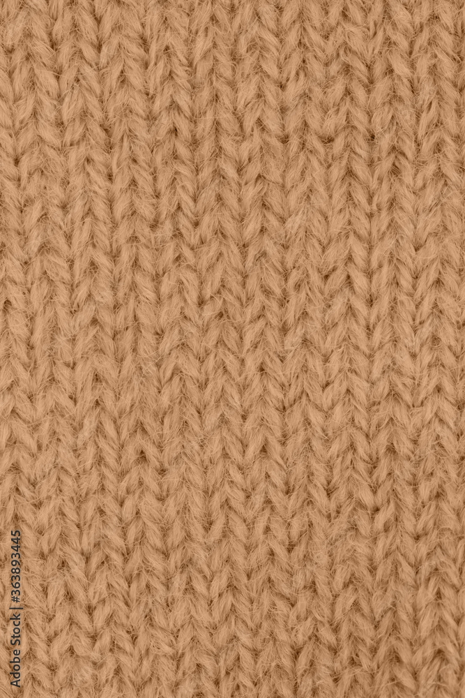 Brown knit textured weave material background Brown knit textured weave material background