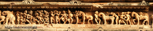 Close up of artful carved walls, Ancient reliefs at famous erotic temple in Khajuraho, Madhya Pradesh, India.