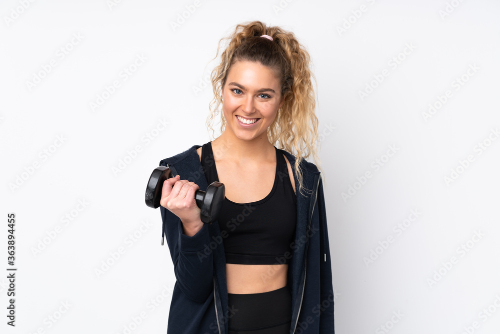 Young sport woman making weightlifting isolated on white background smiling a lot Young sport woman making weightlifting isolated on white background smiling a lot