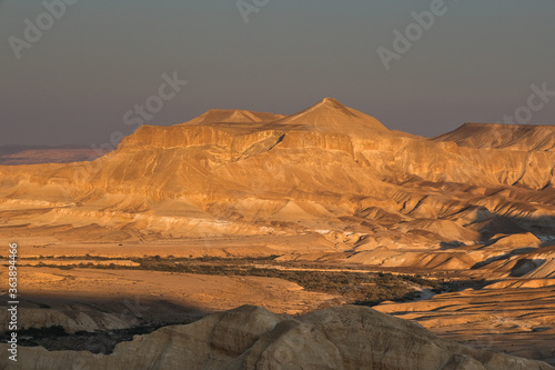 View of Nahal Zin  a 120 km long intermittent stream  the largest canyon in country  as seen at sunset from Sde Boker field school  Negev desert  Israel.