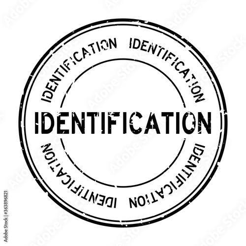 Grunge black identification word round rubber seal stamp on white background