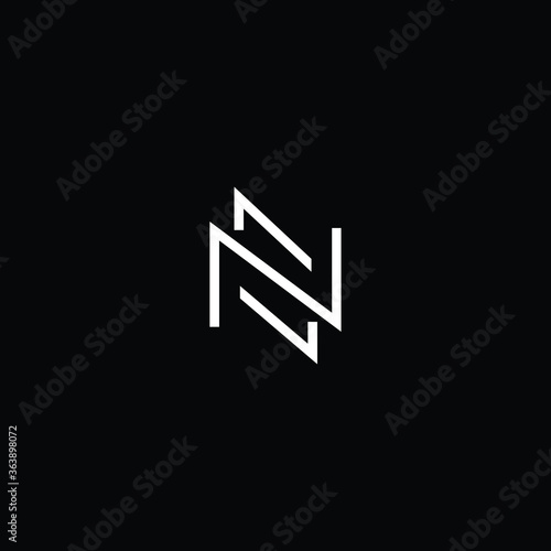 Minimal elegant monogram art logo. Outstanding professional trendy awesome artistic NZ ZN initial based Alphabet icon logo. Premium Business logo white color on black background 