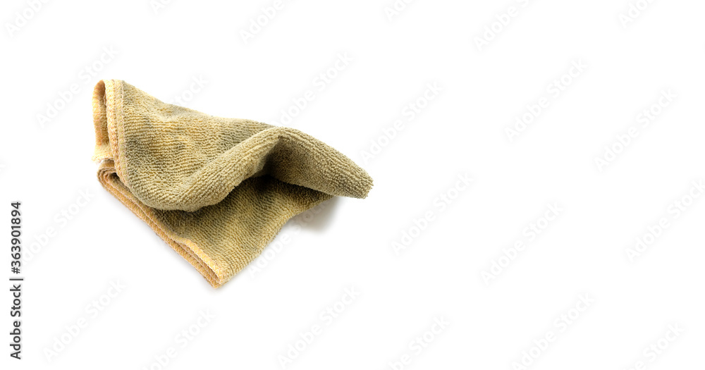 Fototapeta premium Old dirty torn rag isolated on white background. Cleaning rag.