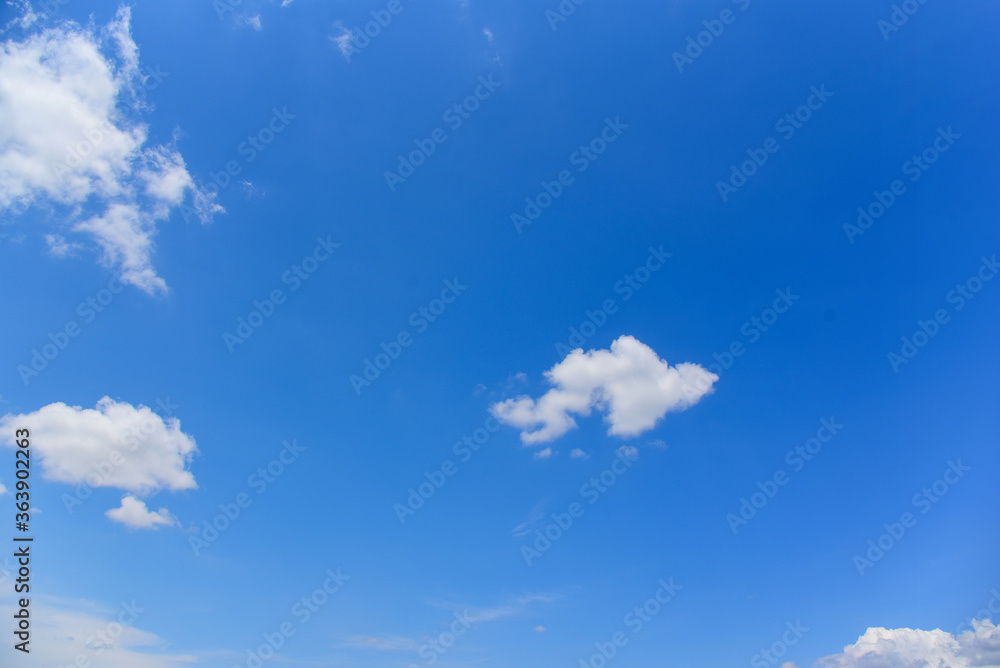 White clouds stand out in the blue sky for texture background White clouds stand out in the blue sky for texture background