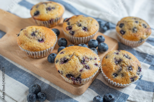 home made sweet vanilla blueberry muffins on a table