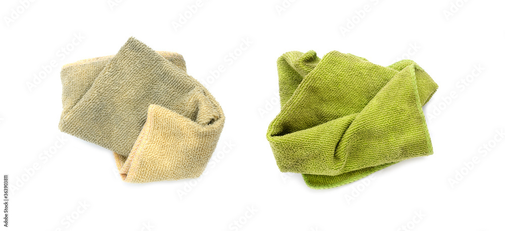 Fototapeta premium Old dirty torn rag isolated on white background. Cleaning rag.