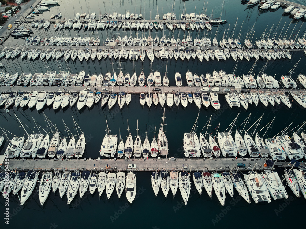 Aerial drone bird's eye view of marina in Athens with docked yachts. Aerial drone bird's eye view of marina in Athens with docked yachts.