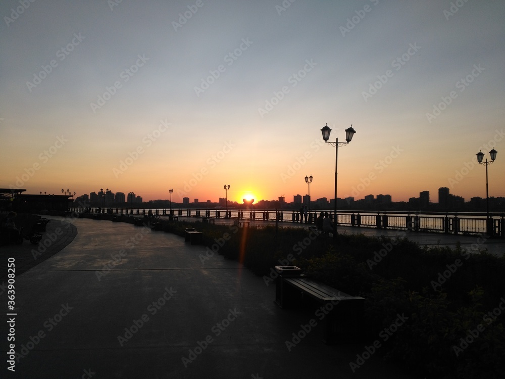 June 5, 2019: A bewitching view of the setting sun caught in the Chalice on yhe embankment of the Kazanka river. 
