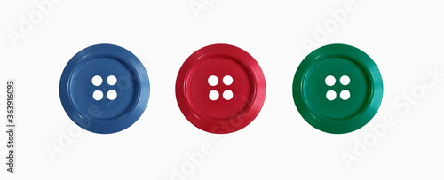 Three colorful sewing buttons for cloth isolated on white background.