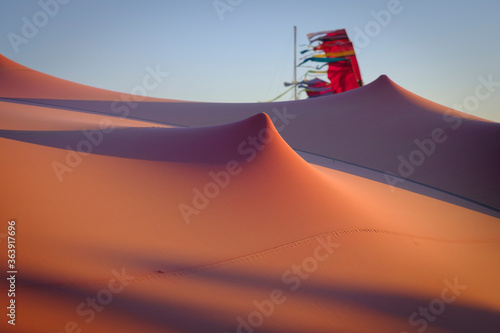 A sand dune and red flag at Afrika Burn 2019 festival event