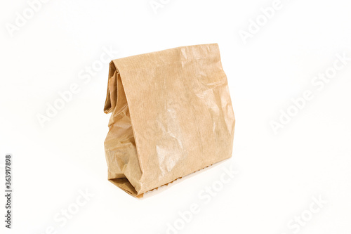 Small paper bag isolated on white background. Grocery bag