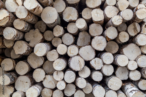 stack of firewood. close up view of birch logs.