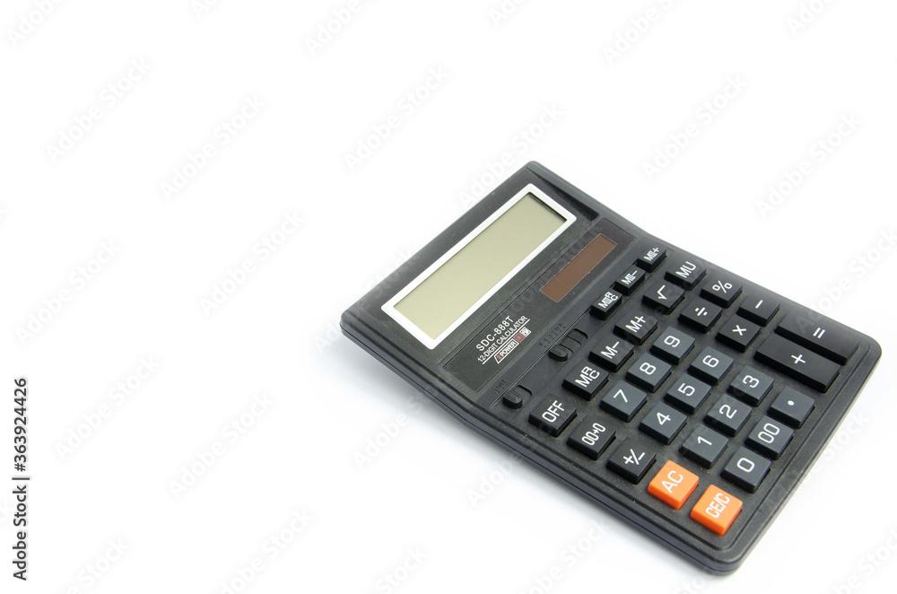 Big black calculator is located on the right on a white background
Big black calculator is located on the right on a white background