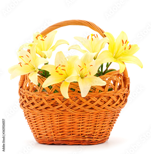 Bouquet of orange lilies in a gift basket.