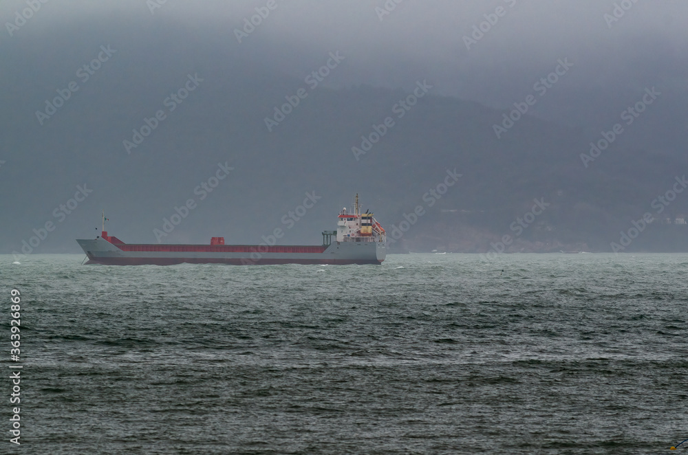 ship at anchor during storm