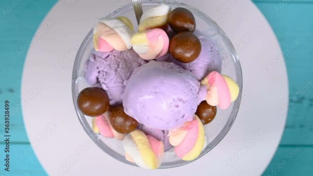 top view bowl of fresh sweet potato flavor ice cream sundae mixed with chocolate candy and marshmallows rotating top view bowl of fresh sweet potato flavor ice cream sundae mixed with chocolate candy and marshmallows rotating