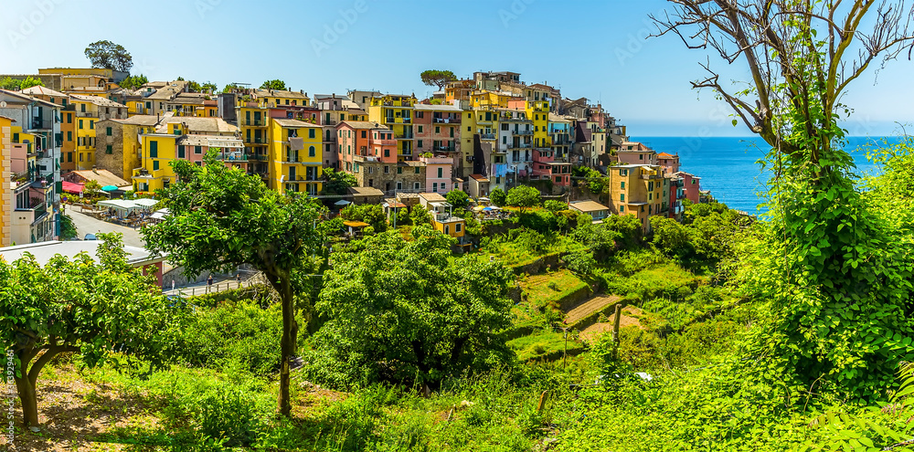 A view across the picturesque Cinque Terre village of Corniglia, Italy in the summertime