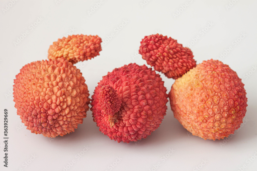 lychee fruit on a white background.Ugly fruit lychee fruit on a white background.Ugly fruit