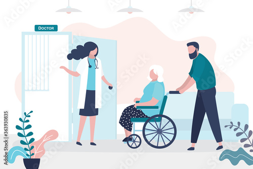 Volunteer or son brought grandmother on wheelchair to doctor appointment. Concept of medical service and geriatric care