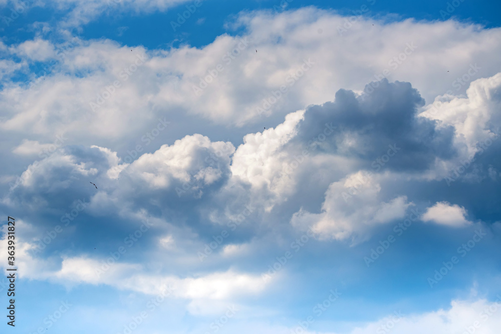 Heavenly blue sky with white clouds background
