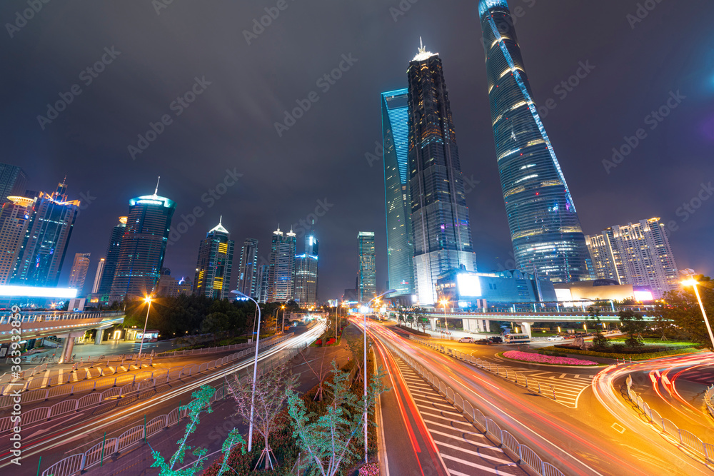 Fototapeta premium high-rise buildings, overpasses and night traffic in the city center