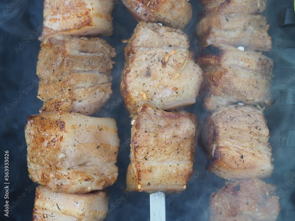 delicious pork skewers are fried on skewers on coals delicious pork skewers are fried on skewers on coals