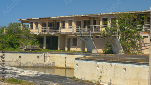 Wallpaper Mural Abandoned hotel and pool decay in the scorching heat in the idyllic Caribbean. Torontodigital.ca