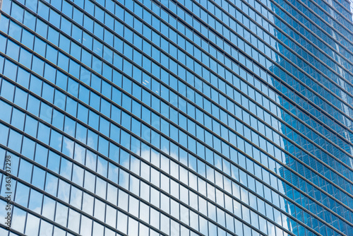 Window glass, Modern architecture in the blue sky white cloud city
