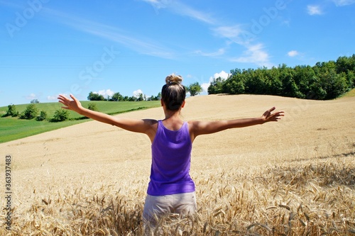 happy young woman in the field