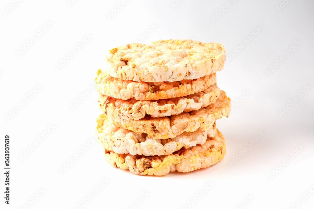 cornbread tortillas on a white background close up macro. bread stacked in a pile on a light background cornbread tortillas on a white background close up macro. bread stacked in a pile on a light background