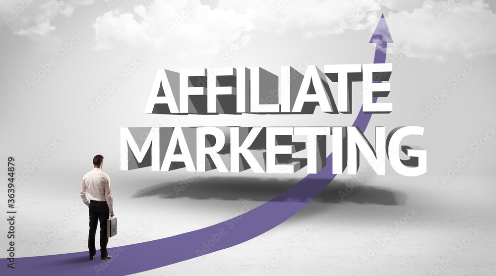 Rear view of a businessman standing in front of AFFILIATE MARKETING inscription, successful business concept Rear view of a businessman standing in front of AFFILIATE MARKETING inscription, successful business concept