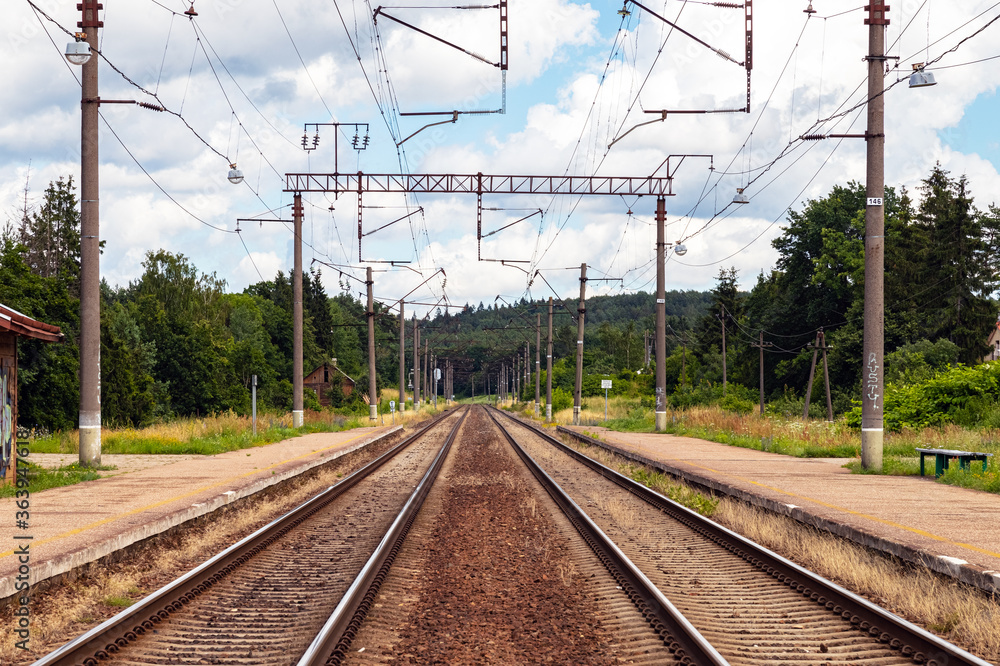 Railway electrified road leading to the city.