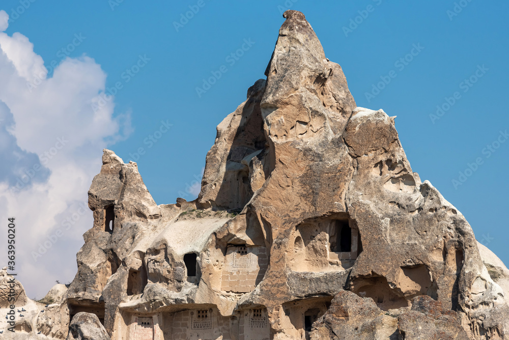Houses built on the rocks of the Goreme Valley. Cappadocia, Turkey.