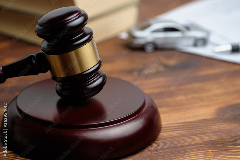 Driver license revocation concept next to the judge hammer Driver license revocation concept next to the judge hammer