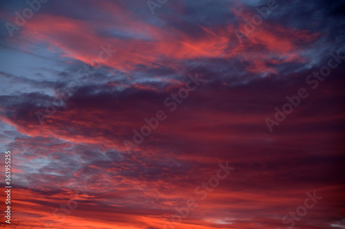 An abstract sky with thick bloody clouds