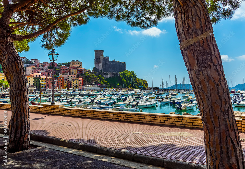 A view across the promenade towards the castle in Lerici, Italy in the summertime