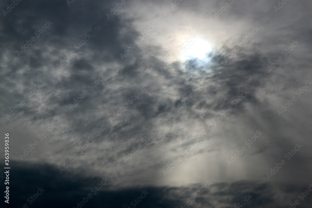 Obraz premium evening view of clouds and sun above the Seliger lake, Russia