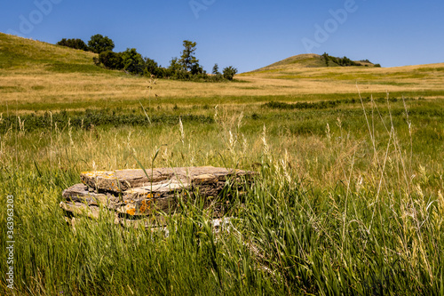 Konstfotografi Old Foundation stones mark the spot of a building in the North Dakota hills at Fort Lincoln near Bismarck