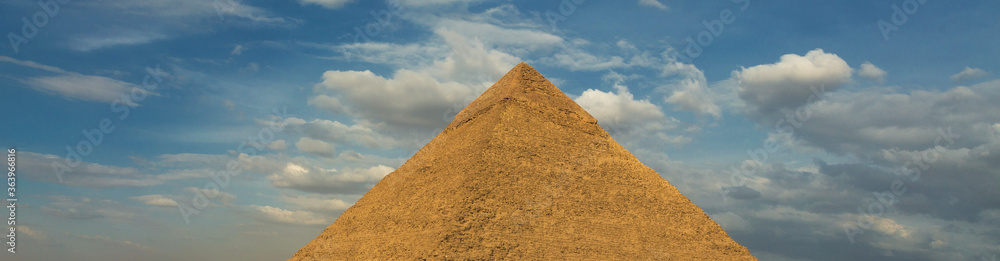 Famous great Giza Pyramids in sand desert in Cairo Famous great Giza Pyramids in sand desert in Cairo