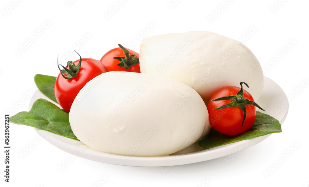 Mozzarella, cherry tomatoes and spinach on a white background. Isolated Mozzarella, cherry tomatoes and spinach on a white background. Isolated