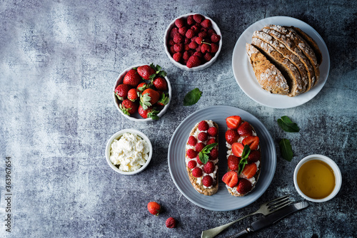 Fresh breakfast with Blueberry, Strawberry and raspberry ricotta rye sandwiches