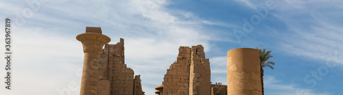 Karnak Temple, Colossal sculptures of ancient Egypt in the Nile Valley in Luxor, Embossed hieroglyphs on the wall