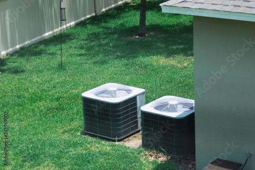 home air conditioner compressor system in backyard