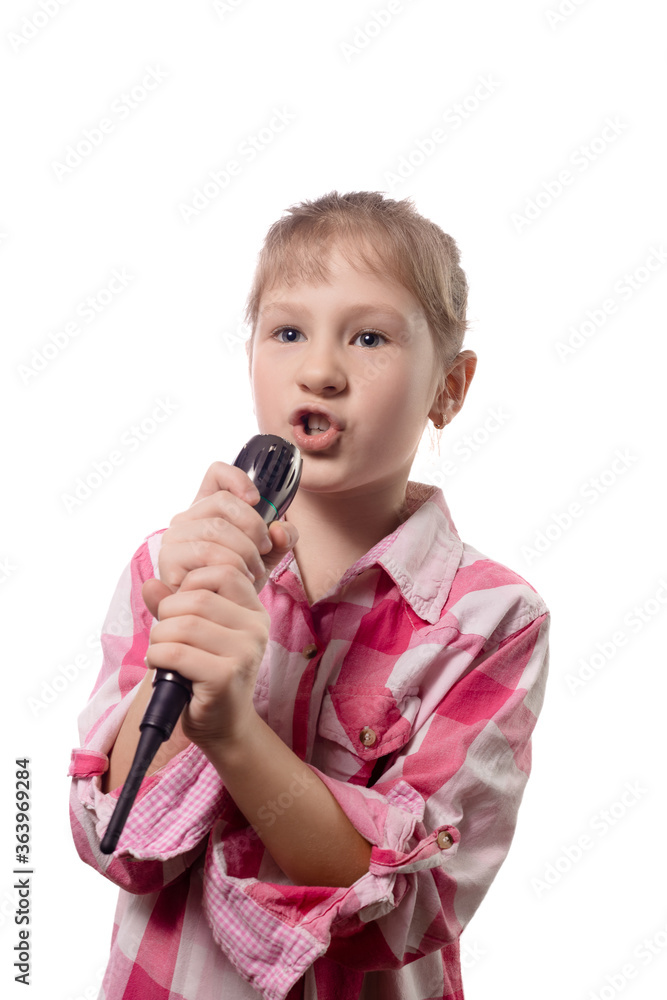 Little cute girl singing into a microphone on a white background Little cute girl singing into a microphone on a white background
