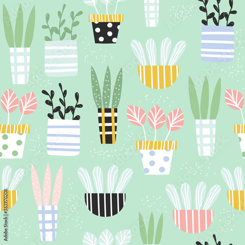 Seamless pattern with potted houseplants. Vector hand drawn illustration. © bilaaa